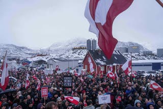 People protest against Trump's policy towards Greenland in front of the US consulate in Nuuk, Greenland, Saturday, Jan. 17, 2026